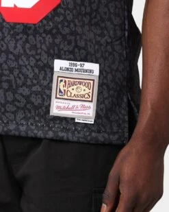 Mitchell & Ness MITCHELL AND NESS WILD LIFE SWINGMAN JERSEY 1996 -97 ALONZO MOURNING 13 Mitchell & Ness MITCHELL AND NESS WILD LIFE SWINGMAN JERSEY 1996 -97 ALONZO MOURNING -Fitness Gear Store 02029453 YB001 mens 0090