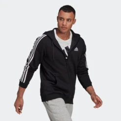 ADIDAS ESSENTIALS FLEECE 3-STRIPES FULL-ZIP HOODIE -Fitness Gear Store Essentials Fleece 3 Stripes Full Zip Hoodie Black GK9051 25 model