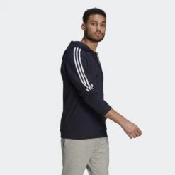 ADIDAS ESSENTIALS FLEECE CUT 3-STRIPES HOODIE -Fitness Gear Store Essentials Fleece Cut 3 Stripes Hoodie Blue GK9584 25 model